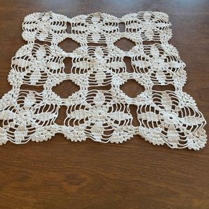 Crocheted cream color doily